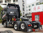 Черная тележка прицепа для трактора цвета с автошинами 295/80Р22.5 и максимальной скоростью 115км/х
